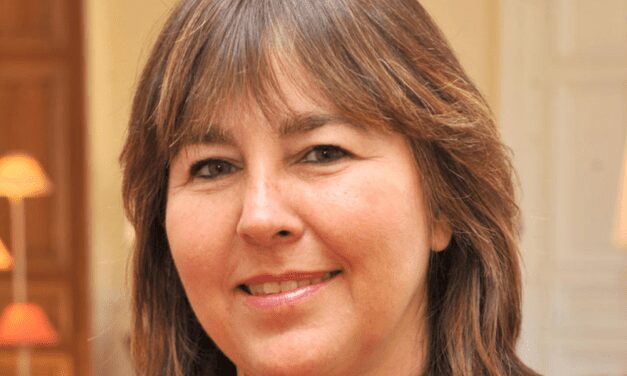 Long-serving minister steps down from her post