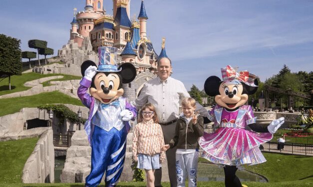 Prince Albert takes children back to Disneyland Paris