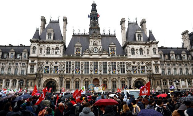 Macron signs contested pension law as unions plan more protests