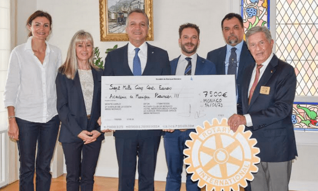 Rotary Club presents cheque to Rainier III Academy