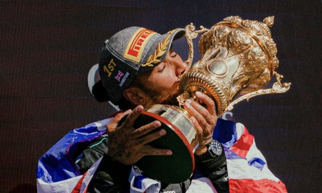 Hamilton returns to winning ways with emotional record victory at Silverstone
