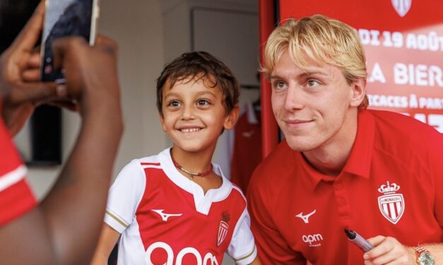 AS Monaco fans mob star striker Mika Biereth at summer village