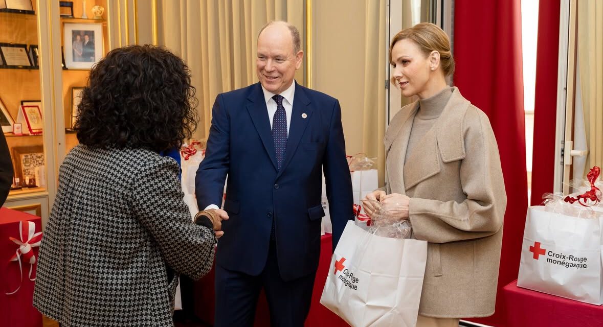 Prince Albert II and Princess Charlene distribute traditional Red Cross gift parcels
