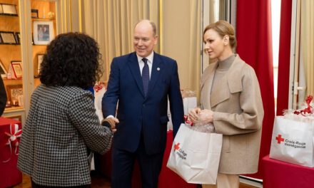 Prince Albert II and Princess Charlene distribute traditional Red Cross gift parcels