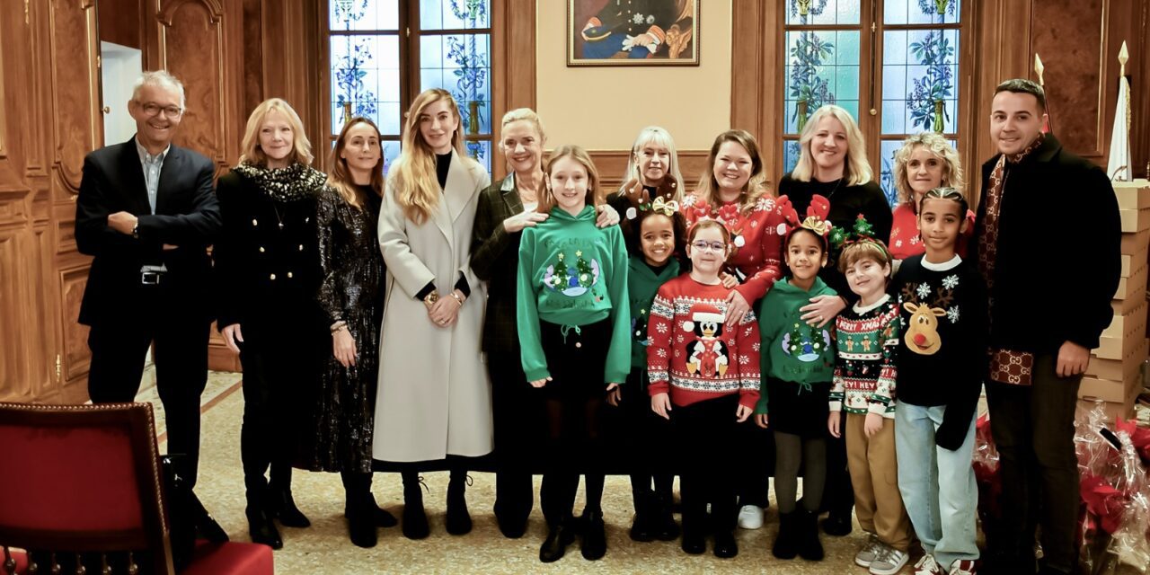 Monaco schoolchildren spread Christmas cheer to elderly residents
